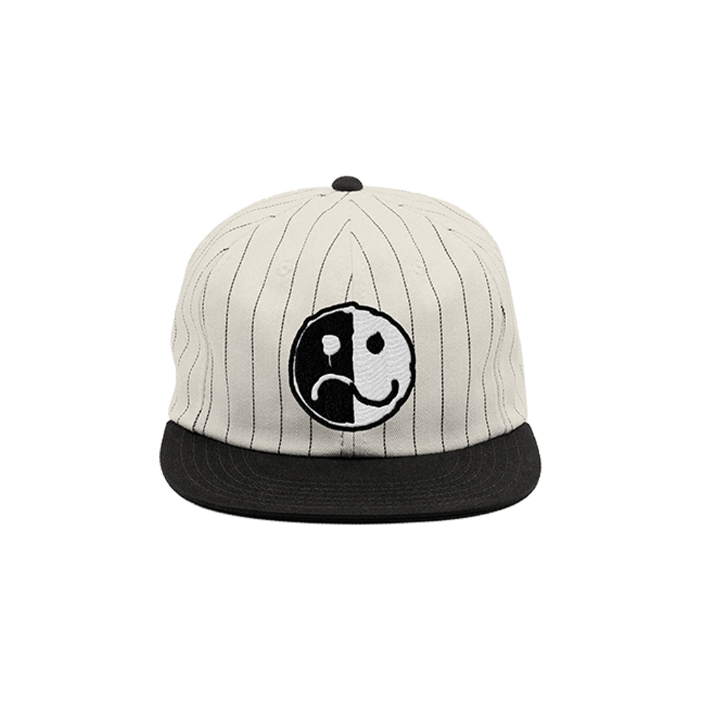 Baseball-style cap with a pinstriped design and a yin-yang smiley face logo on the front.