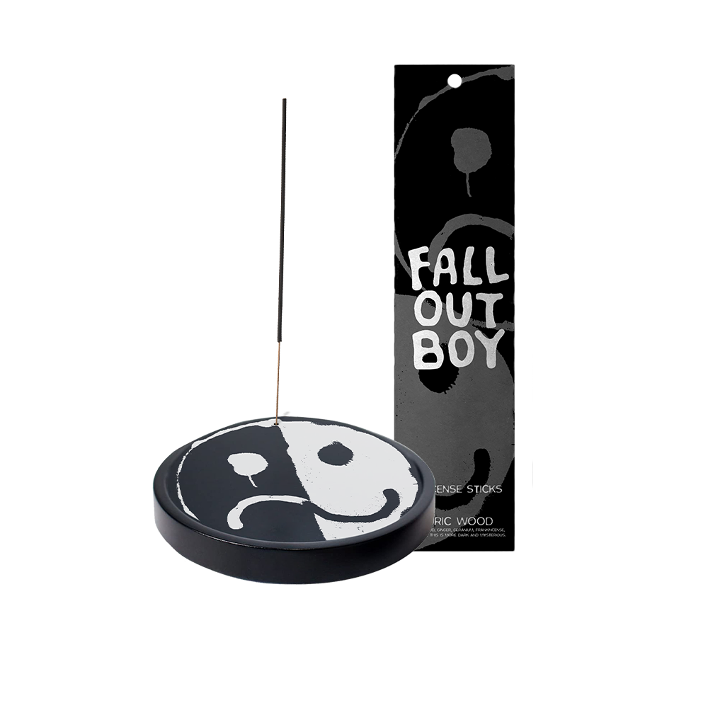 Yin-yang shaped incense holder with ’Fall Out Boy’ packaging.