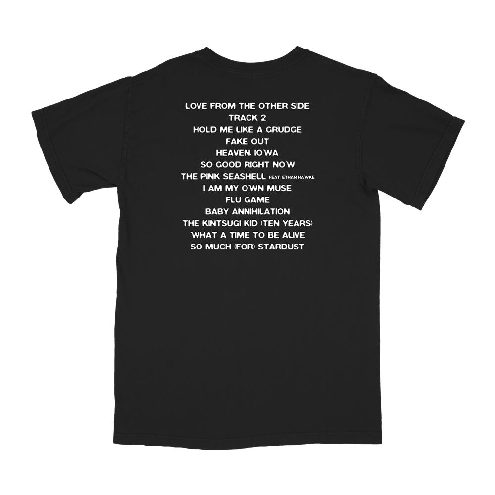 Black t-shirt with white text listing song titles or track names.